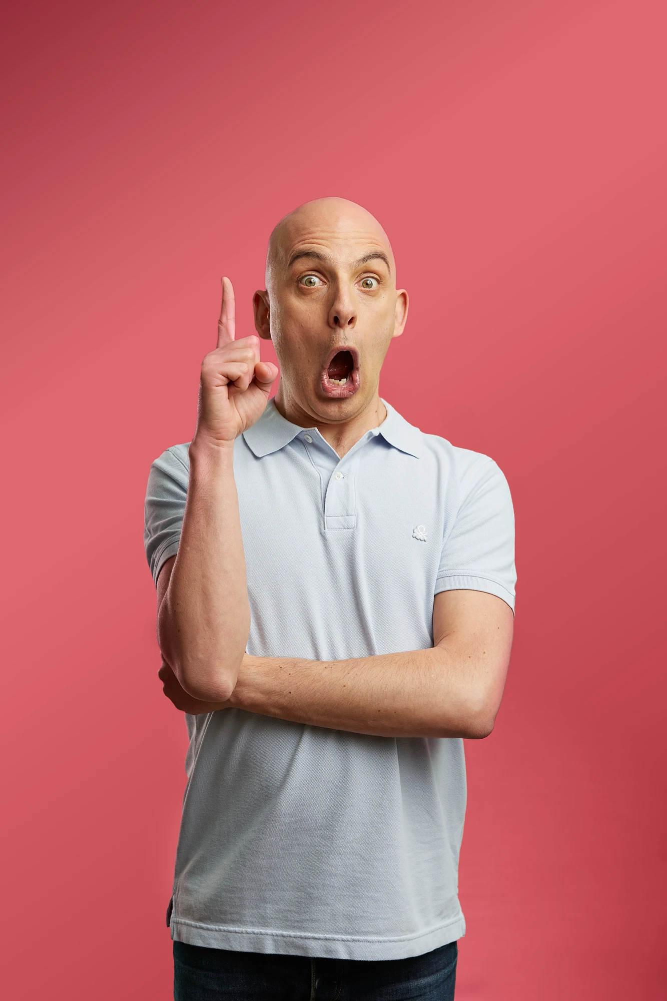 Browns Pharmacy Bald Man Surprised Pointing Up — commercial portrait by Stephen Galea, Malta