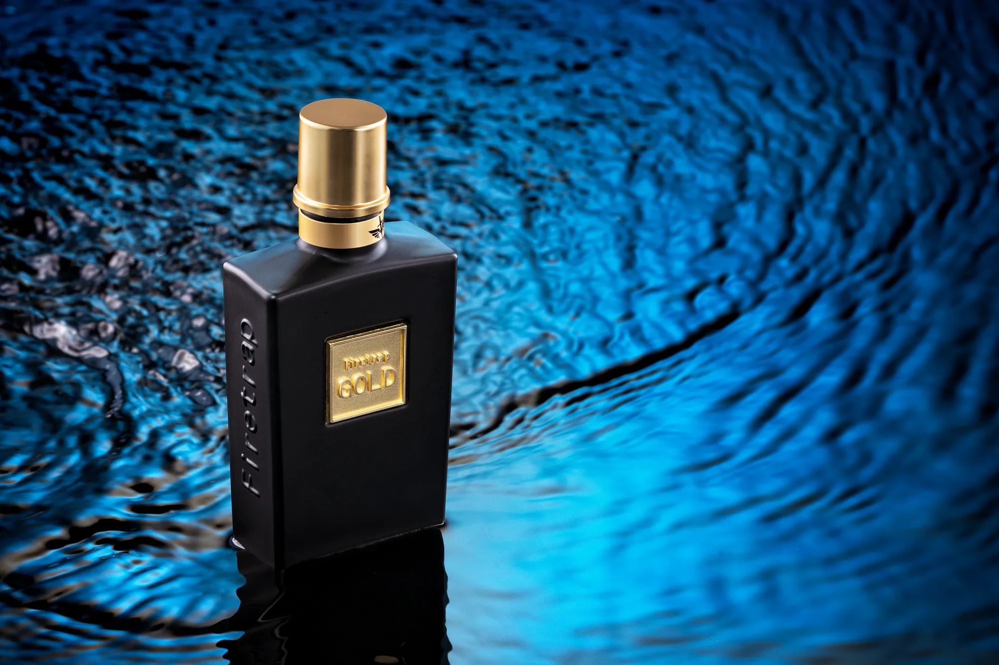 Firetrap Gold Cologne Fragrance Bottle Product — product photography by Stephen Galea, Malta