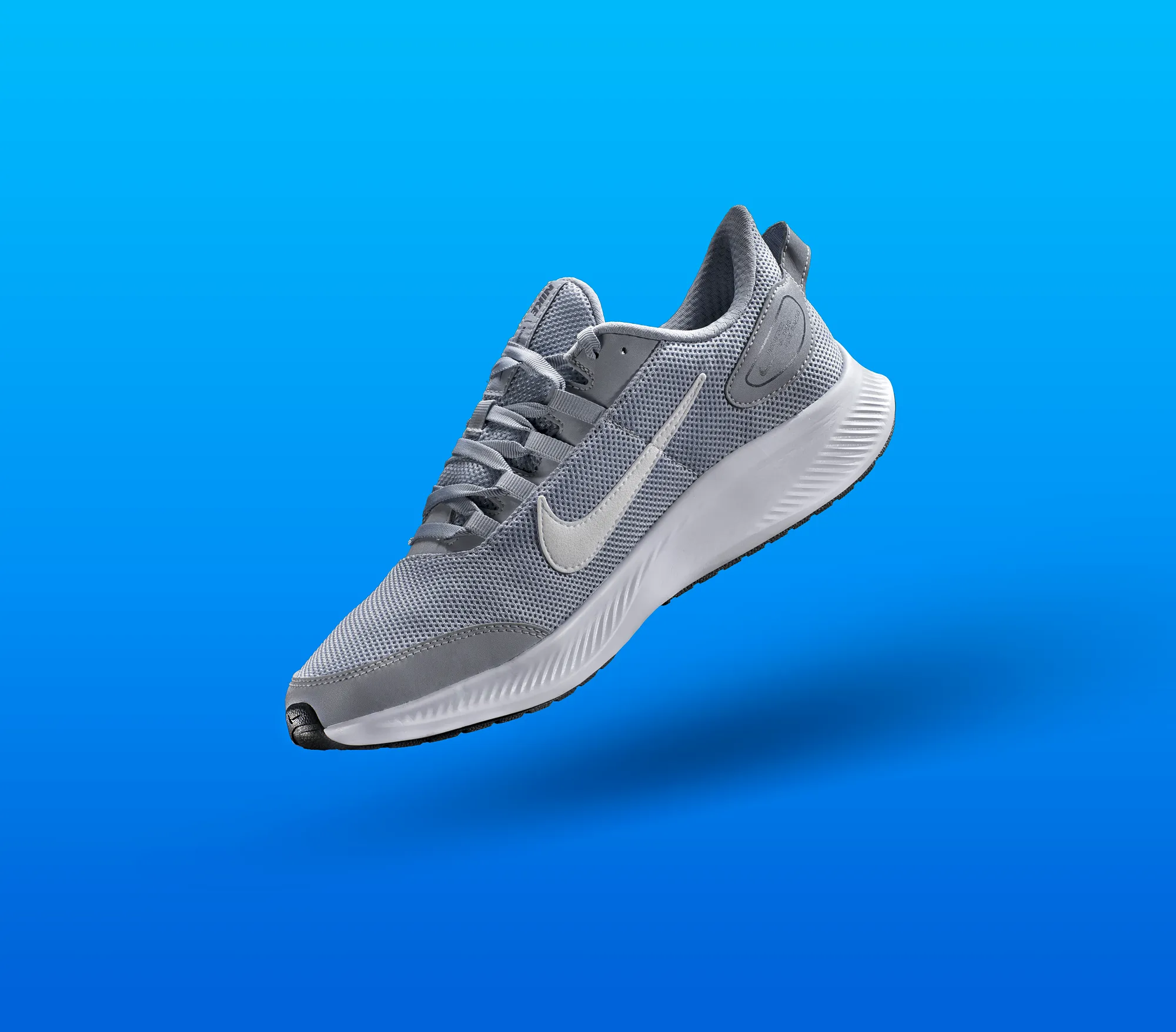 Nike Sneaker Product Blue Background — product photography by Stephen Galea, Malta