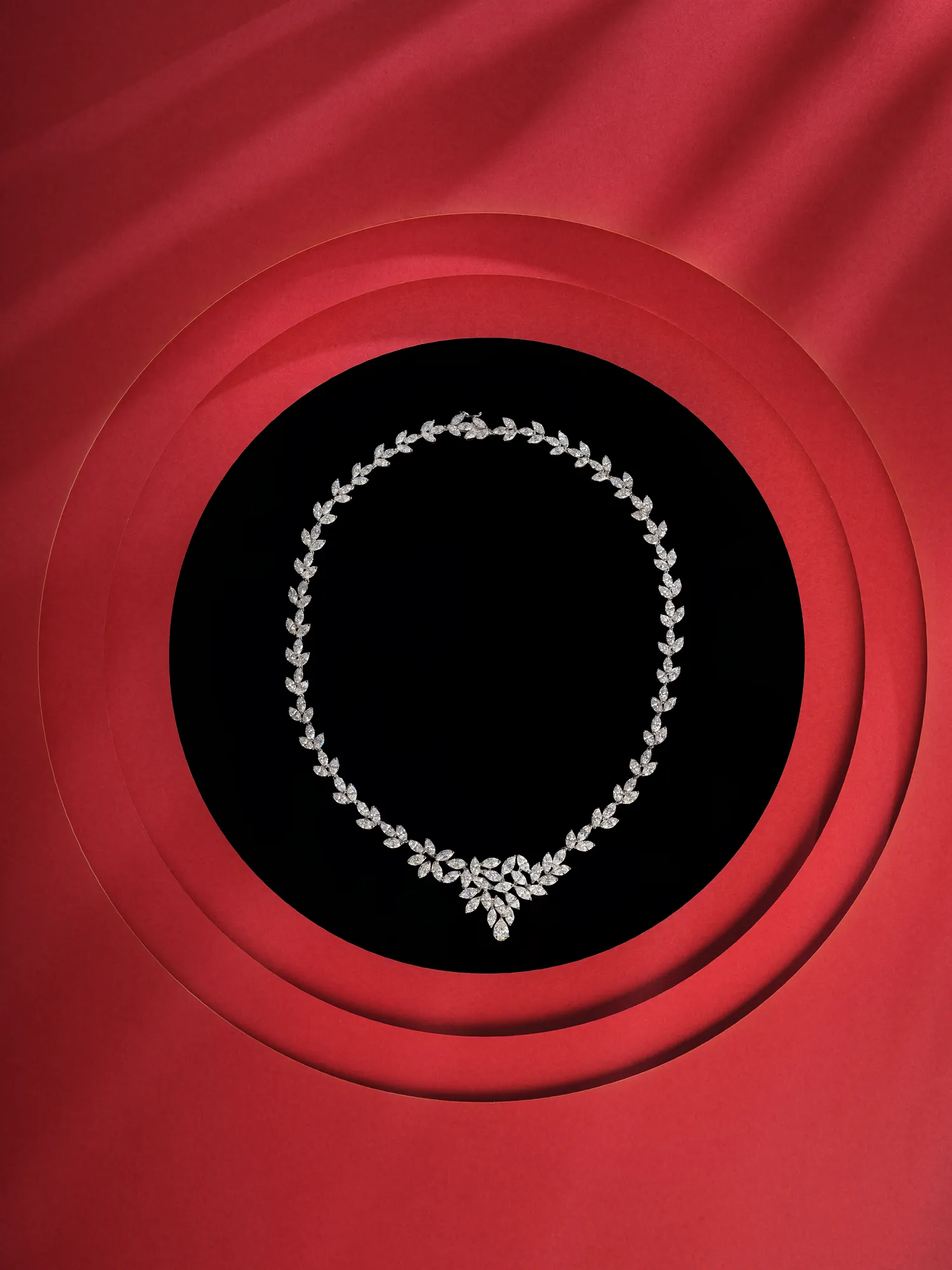 Frank Zampa Diamond Jewellery Product Red Background — product photography by Stephen Galea, Malta